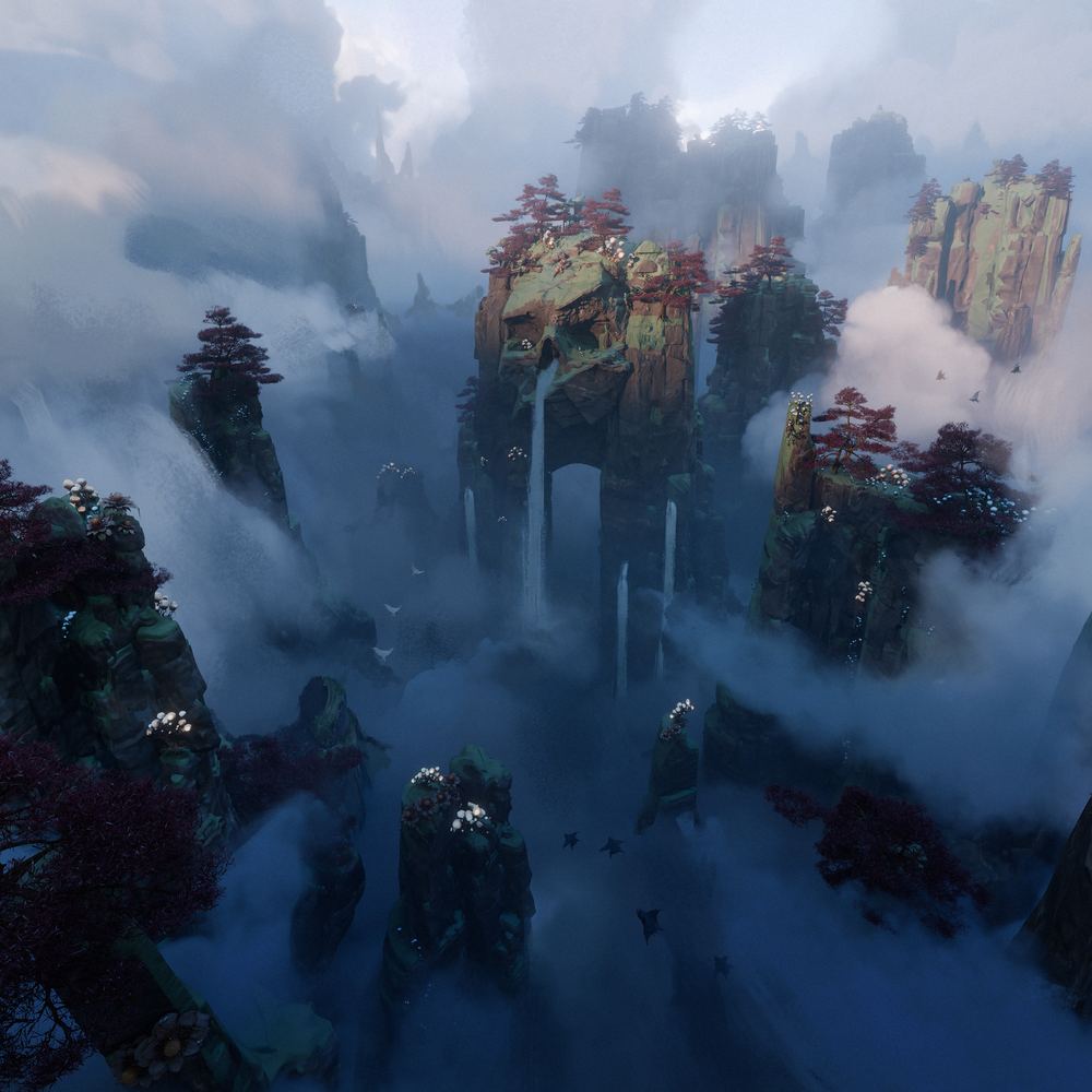 Aerial view of misty rock spires and waterfalls