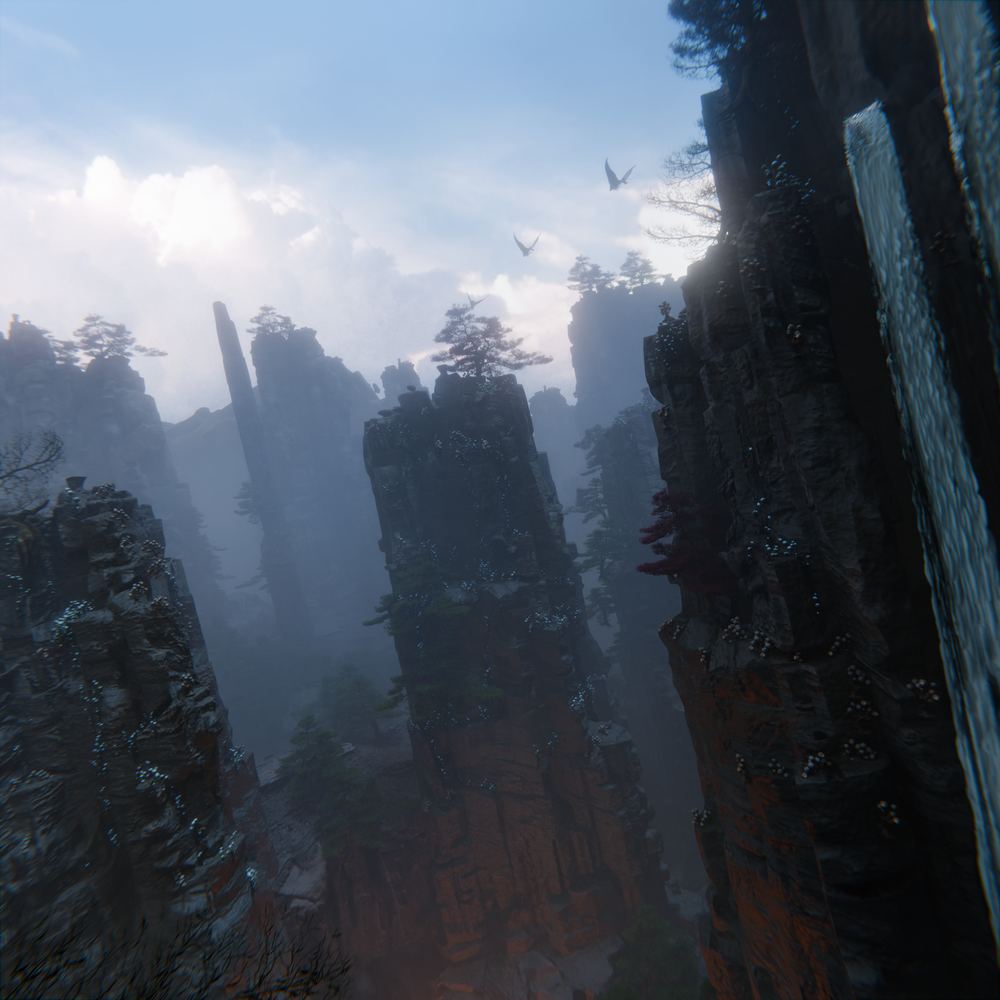 Misty canyon of tall rock spires